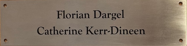 Example engraved plaque reading 'Florian Dargel, Catherine Kerr-Dineen'